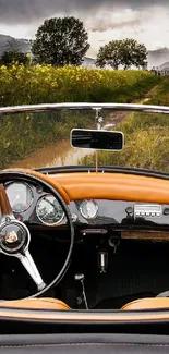 Vintage car interior against a lush green landscape with scenic views.