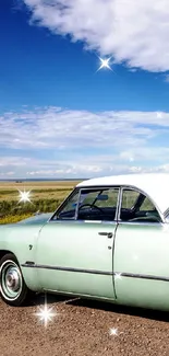 Vintage car parked on a scenic landscape under a vibrant blue sky.