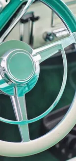 Vintage car steering wheel with teal accents.