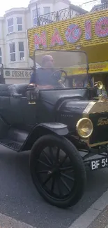 Vintage Ford car driving on a busy street.