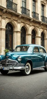 A classic vintage car parked on a city street with historic buildings.