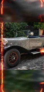 Vintage car with fiery accents on a cobbled street background.