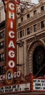 Vintage Chicago theater sign with historic architecture.