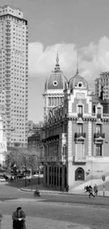 Vintage cityscape in black and white with historic architecture.