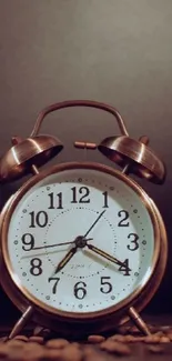 Vintage copper clock with coffee beans, perfect for mobile wallpaper.