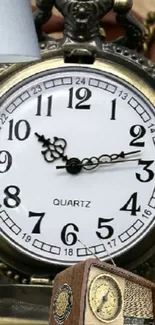 Vintage clock with classic design elements in a still life setting.