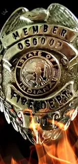 Close-up of an Osgood Fire Department badge on a black background.