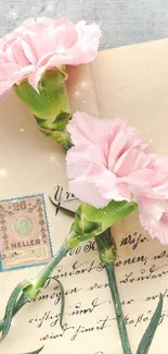 Vintage wallpaper with pink flowers and old letters.