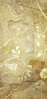 Vintage floral wallpaper with cream leaf motifs on a rustic background.