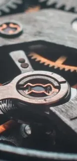 Close-up view of vintage mechanical gears in a grey and bronze color palette.