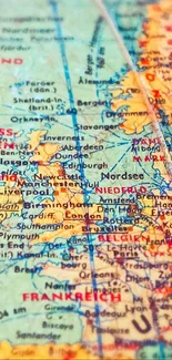 Vintage-style globe map with focus on Europe in warm tones.