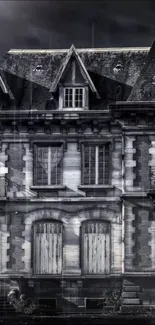 Vintage gothic manor with dark, eerie aesthetic in grayscale tones.