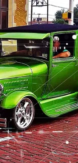 A vibrant green vintage truck on a red brick street.