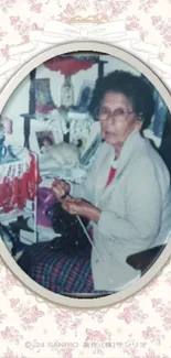 Vintage wallpaper of a grandmother knitting in a floral frame.