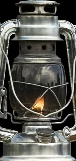 Vintage kerosene lantern glowing with rustic charm, perfect for mobile wallpaper.