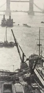 Vintage view of London's river with historic ships and bridge in monochrome.