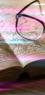 Vintage map with eyeglasses resting on top, in brown tones.