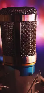 Vintage microphone with colorful lights background.