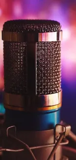 Vintage microphone with colorful blurred background