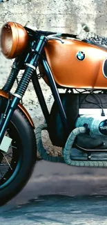 Vintage motorcycle with burnt orange finish against urban backdrop.