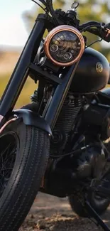 Close-up of vintage motorcycle with black details.