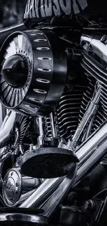 Close-up of vintage motorcycle engine in chrome and black tones.
