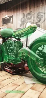 Vintage garage with green motorcycle on stand.