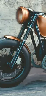 Copper-toned vintage motorcycle parked against a textured wall background.