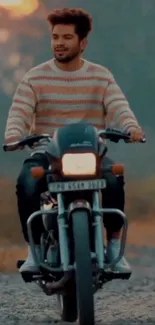 A man rides a vintage motorcycle on a gravel path amidst scenic nature.