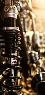 Close-up of vintage motorcycle suspension with warm lighting.