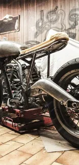 Vintage motorcycle in a workshop setting, showcasing classic design and craftsmanship.