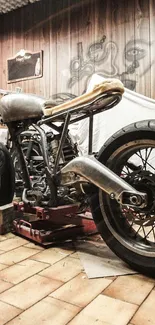 Vintage motorcycle in a rustic workshop with tools and shelves.