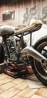 Vintage motorcycle in workshop setting.