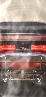 Smoky vintage muscle car wallpaper.