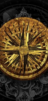 Vintage golden compass on dark background wallpaper.