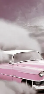 Vintage pink car emitting smoke on a scenic background.