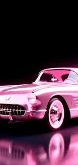 Vintage pink car with reflective shine.
