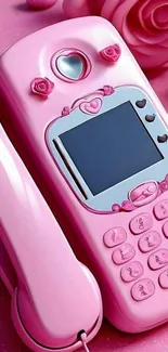 Vintage pink phone with floral decorations and roses.