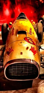 Vintage racing car with gold finish in a dramatic setting.