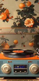 Vintage record player with a floral backdrop wallpaper.