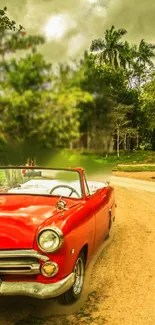 Vintage red car on a winding countryside road.