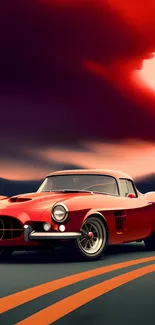 Vintage red car on a scenic sunset drive with a bold sky.