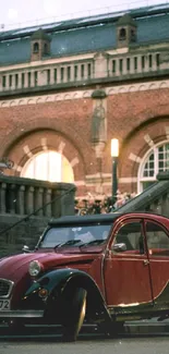 Vintage car parked by historic building in cityscape.