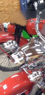 Close-up of a vintage red motorcycle with chrome details.