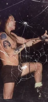 Dynamic rock concert wallpaper with tattoos and broken glass effect.