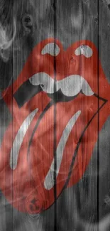 Rock icon lips logo on dark wooden background wallpaper.