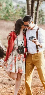 Vintage romantic couple in forest setting, autumn attire.