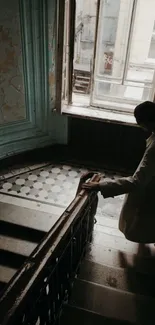 Vintage staircase with a person in a trench coat, ambient light and muted colors.