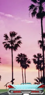 Vintage car under a pink sunset with palm trees.