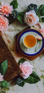 Vintage tea and roses wallpaper with a classic book.